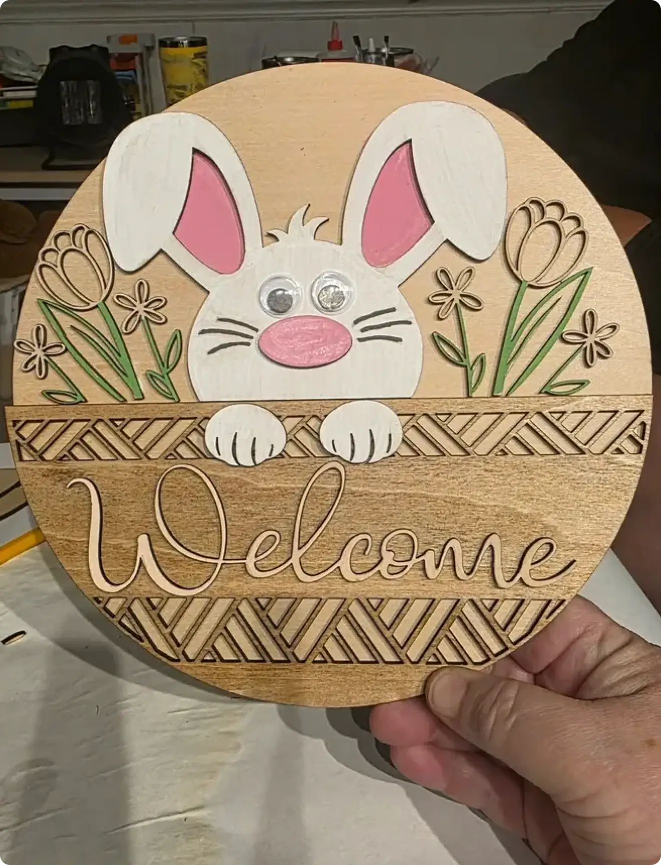 Wooden welcome sign with rabbit design