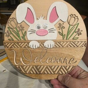 Wooden welcome sign with bunny design