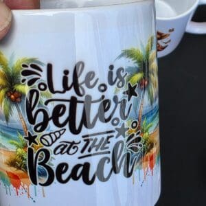 Tropical beach scene on ceramic mug