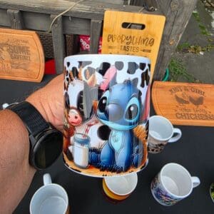 Colorful mug with cute characters displayed