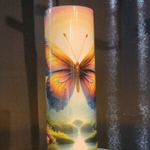 Colorful butterfly on decorative candle