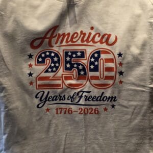 White shirt celebrating America's 250th anniversary.